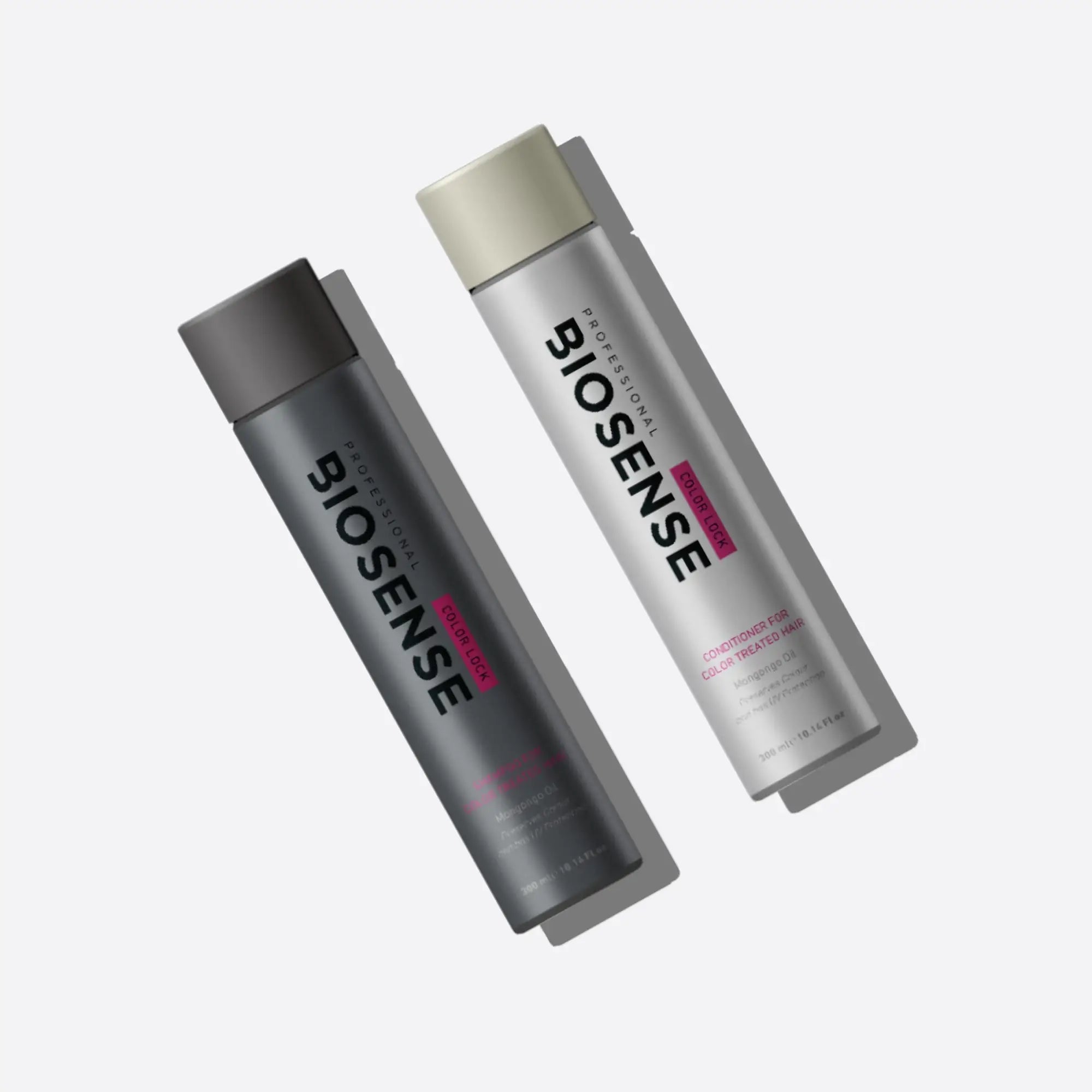 Two Biosense Color Lock cylindrical bottles, color seal shampoo and conditioner in gray and silver.