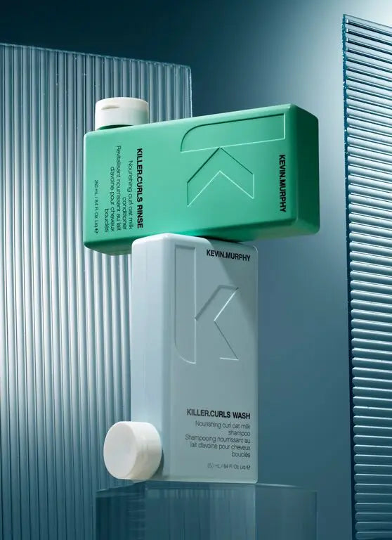 Mint green and white rectangular bottles of Kevin Murphy products with quality ingredients