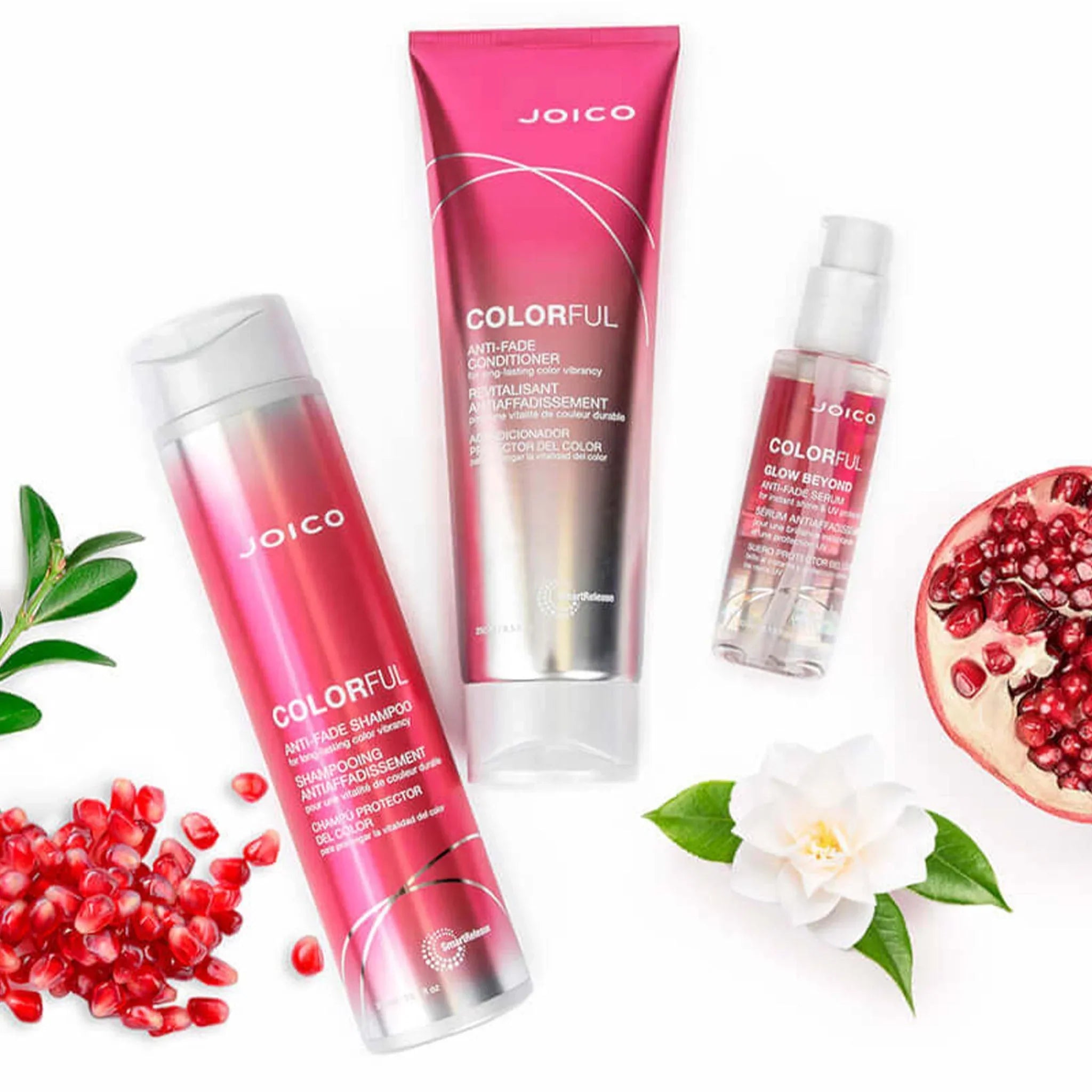Joico Colorful Antifade products in pink packaging with pomegranate and floral accents.