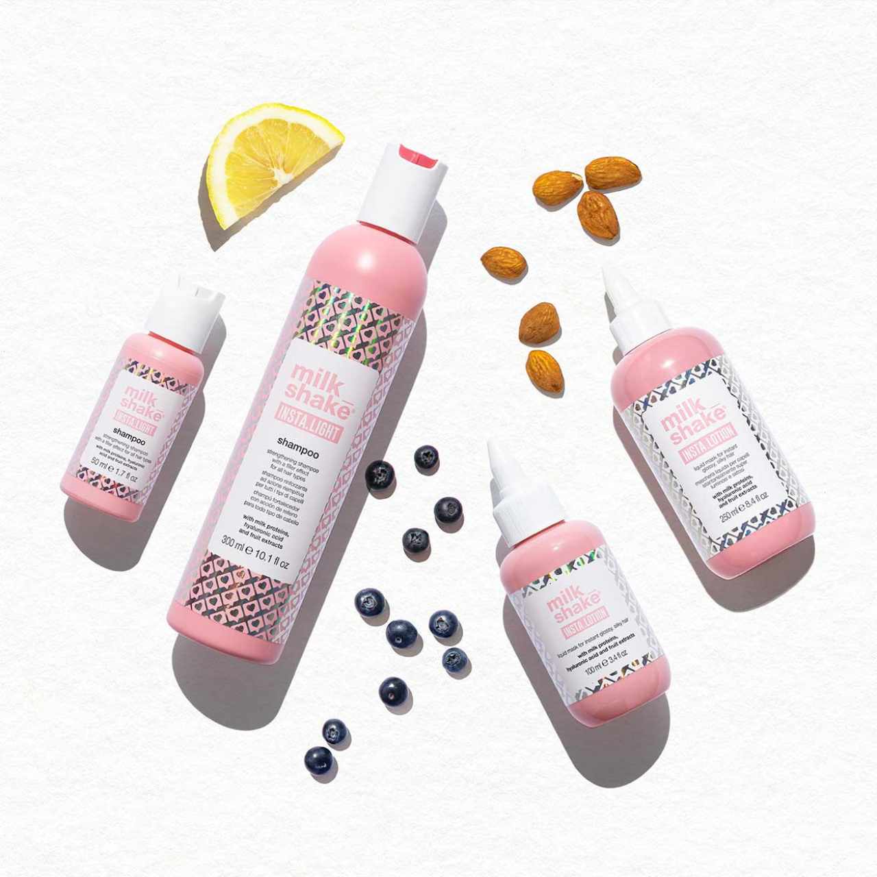 Milkshake Insta Light: Shampoo, Lotion. Pink bottles, blueberries, almonds, lemon. Hair care.