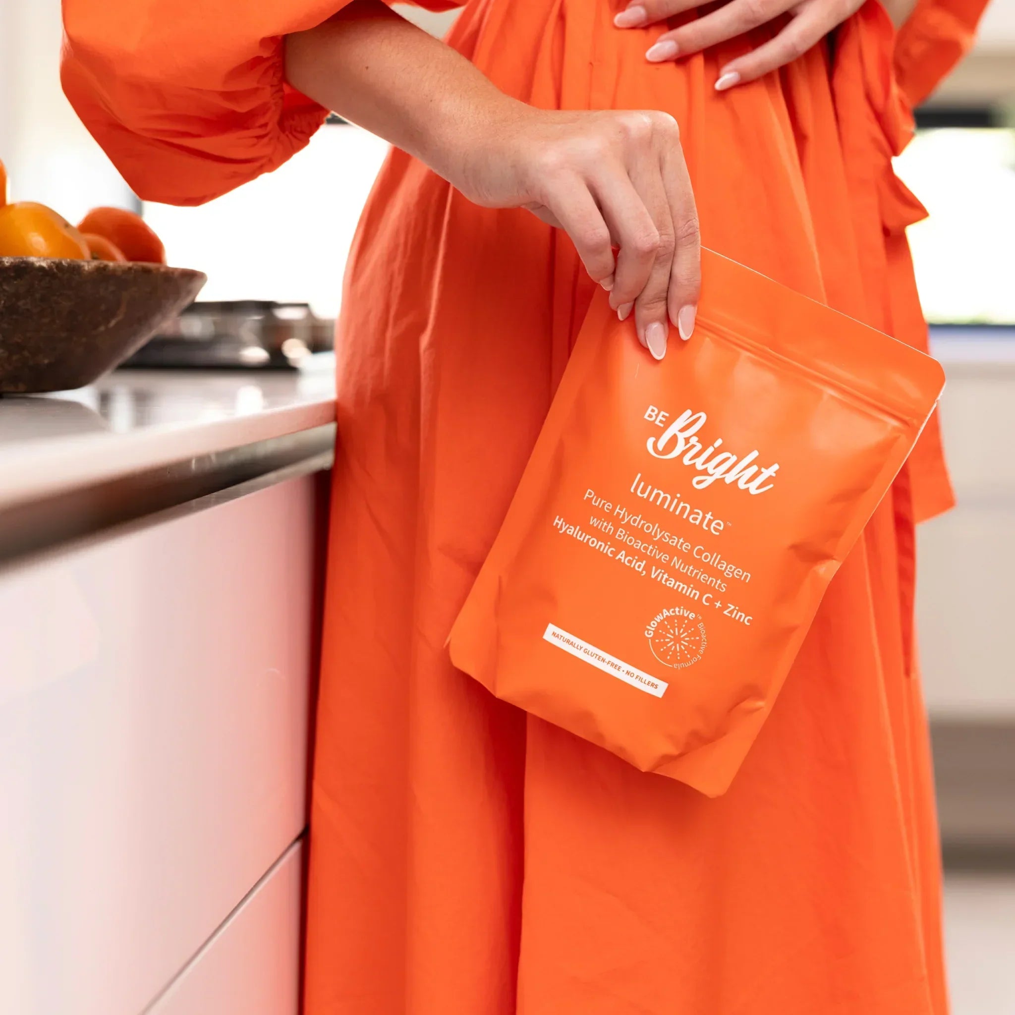 Be Bright Collagen Powder: Illuminate Your Skin. Hydrolysate Collagen for Radiant Skin & Health. Beauty Supplement. Orange Dress.