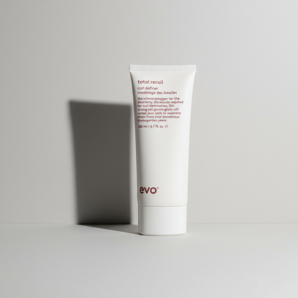 EVO Total Recoil Curl Definer in a white squeeze tube with red text for styling curls