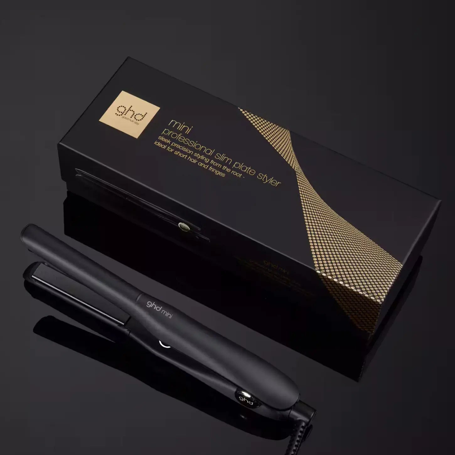 Black ghd Mini Hair Straightener with packaging box and ceramic floating plates
