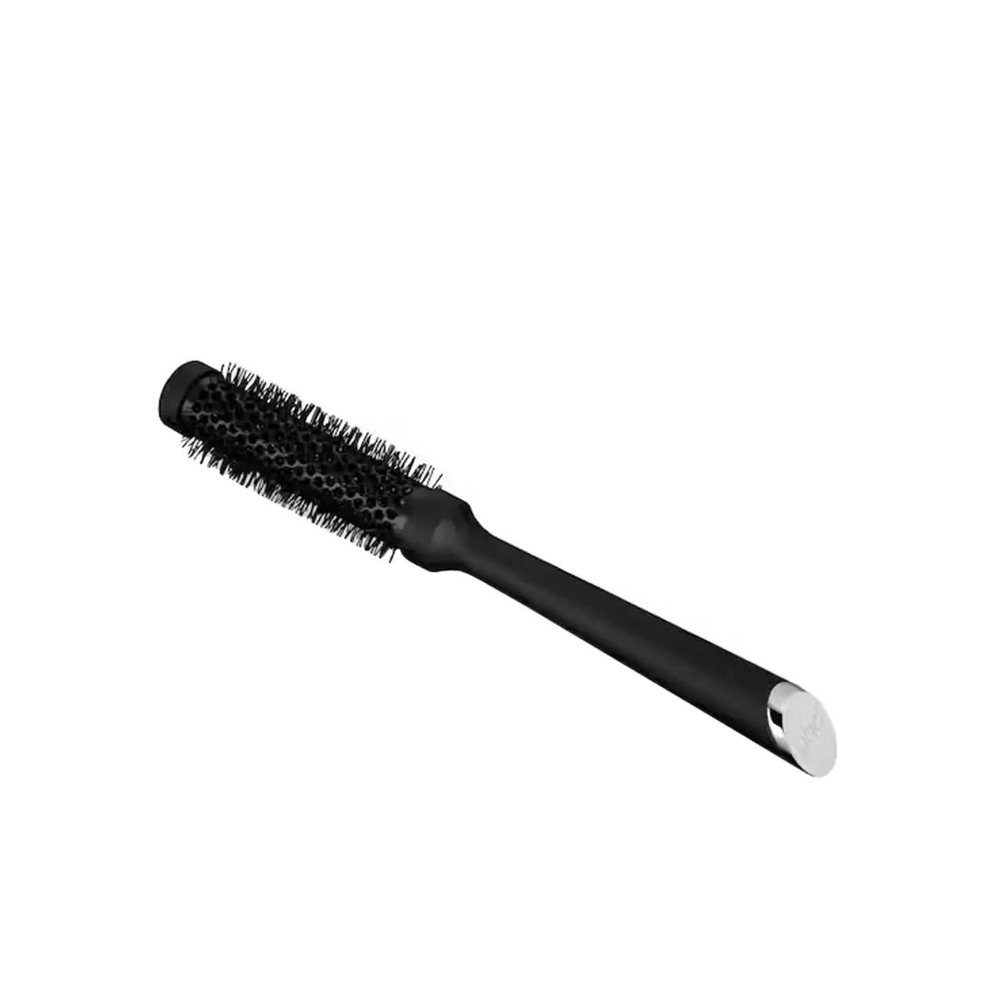 Round ghd The Blow Dryer Radial Brush with a black handle and 25mm barrel for root lift