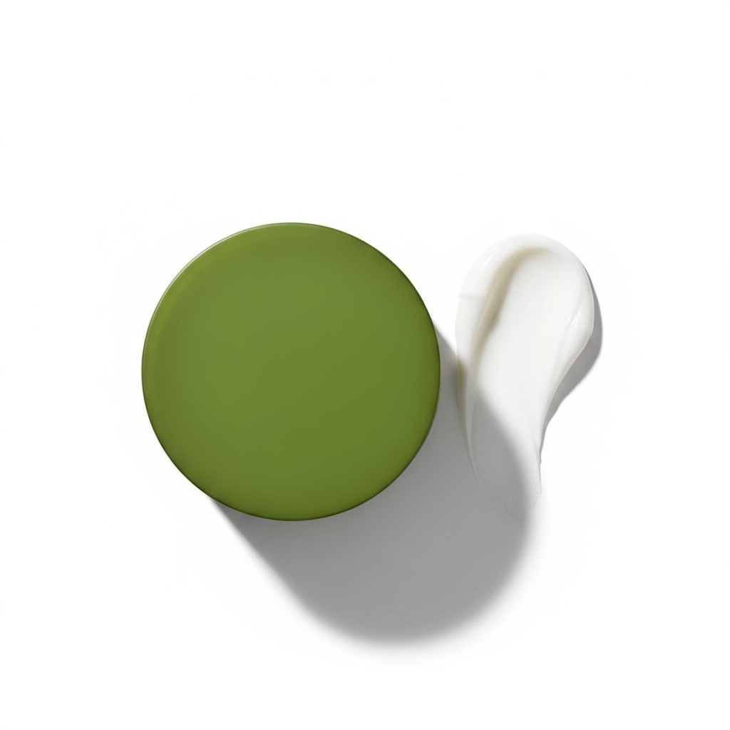 Top view of Inoar Argan Moisture Mask with green lid and creamy white texture on white background