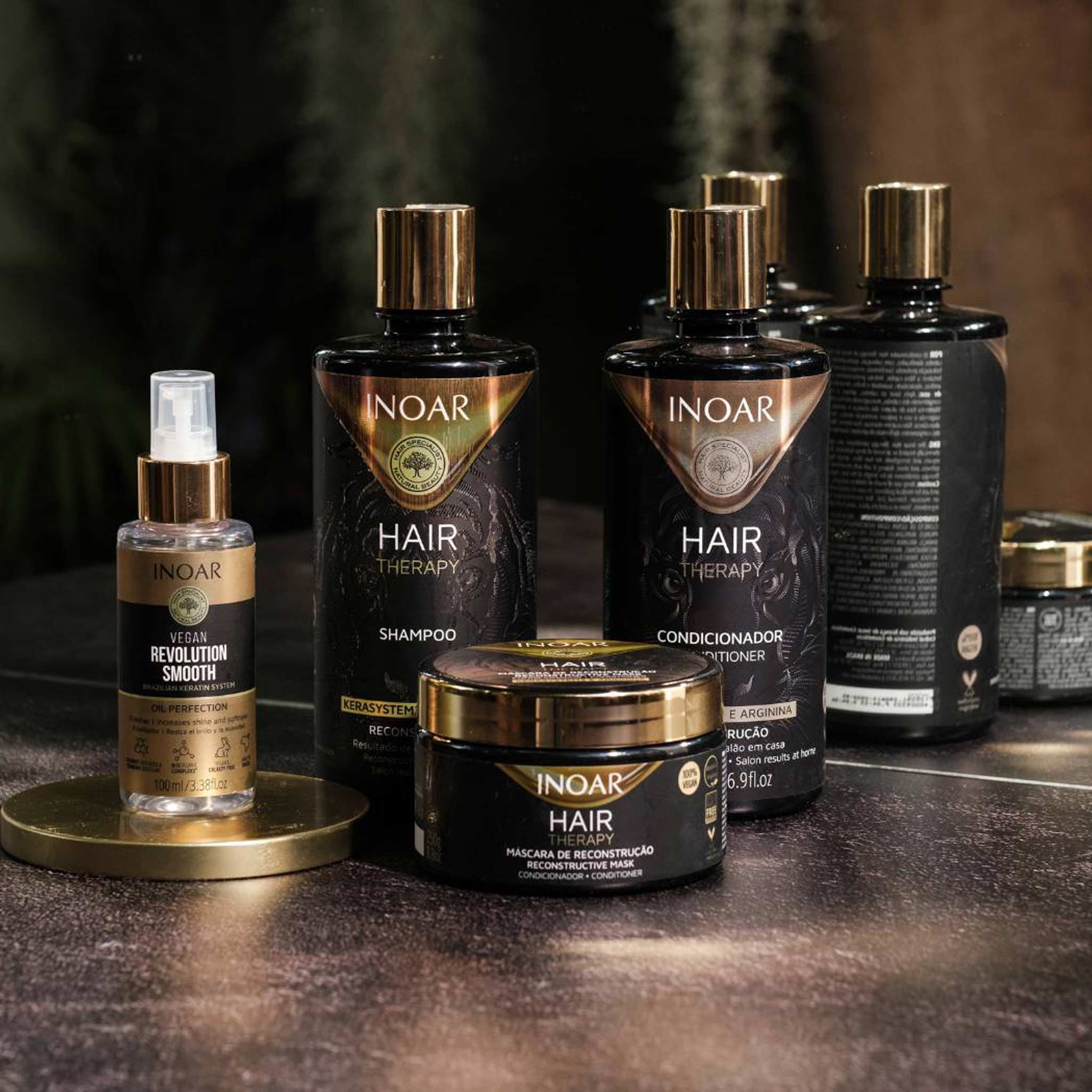 INOAR Revolution Smooth Perfection Oil 100ml beside hair care products, showcasing a solution for smooth, frizz-free hair.