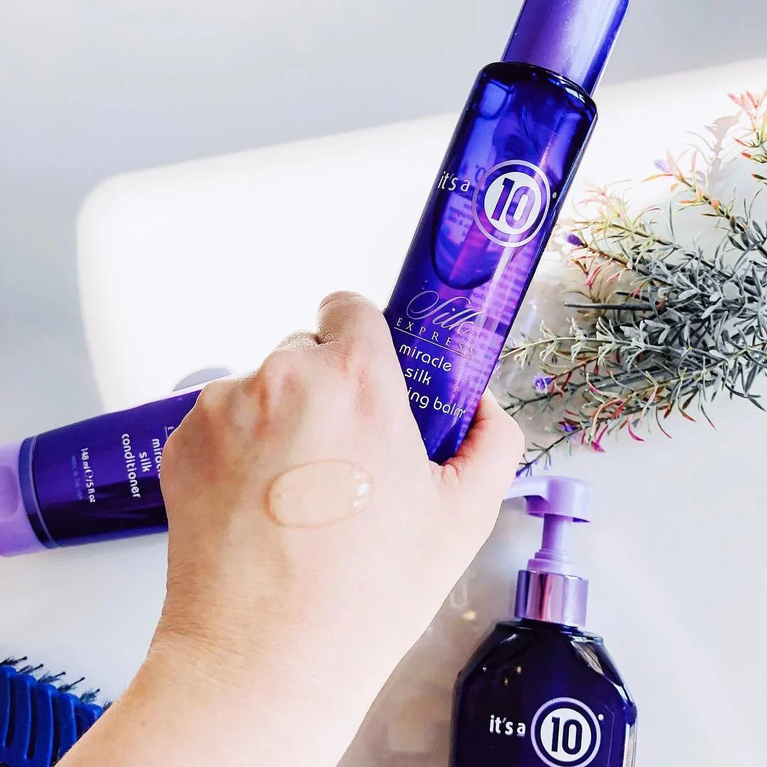 It's a 10 Miracle Smoothing Balm: Hair product showcase with texture demonstration. Hair care routine enhancement.