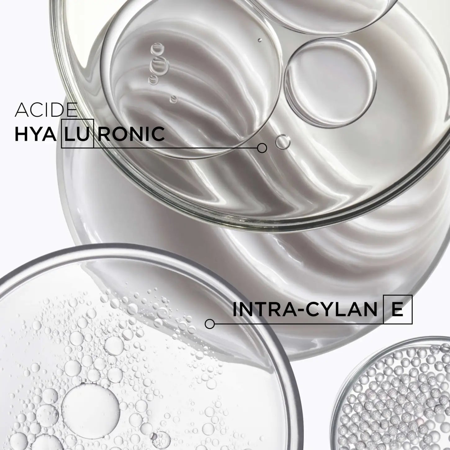 Kérastase Densifique formula under microscope. Hyaluronic Acid & Intra-Cylane close up. Hair thickening, density.