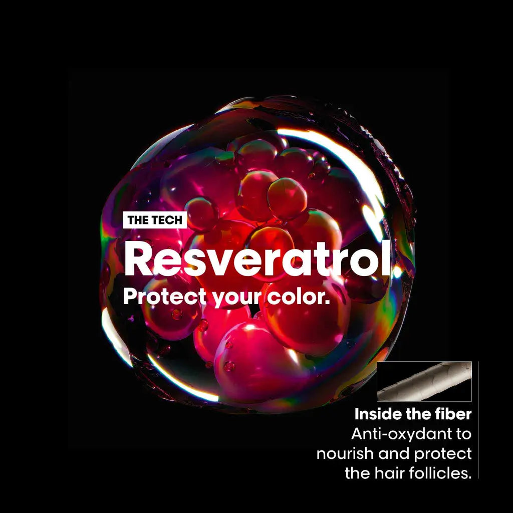 Cluster of red spheres resembling grapes encased in a transparent bubble.