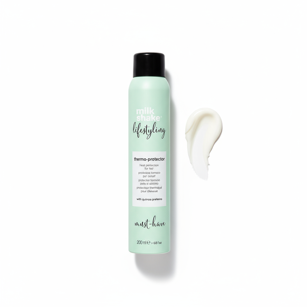 Milkshake heat protection spray for hair in mint green bottle with product cream swatch