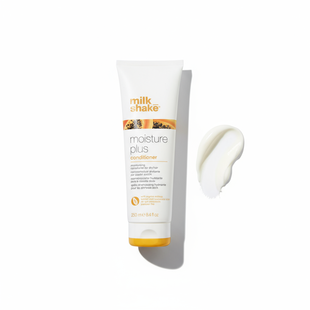 Milkshake Moisture Plus Conditioner tube with creamy white conditioner swatch for dry hair
