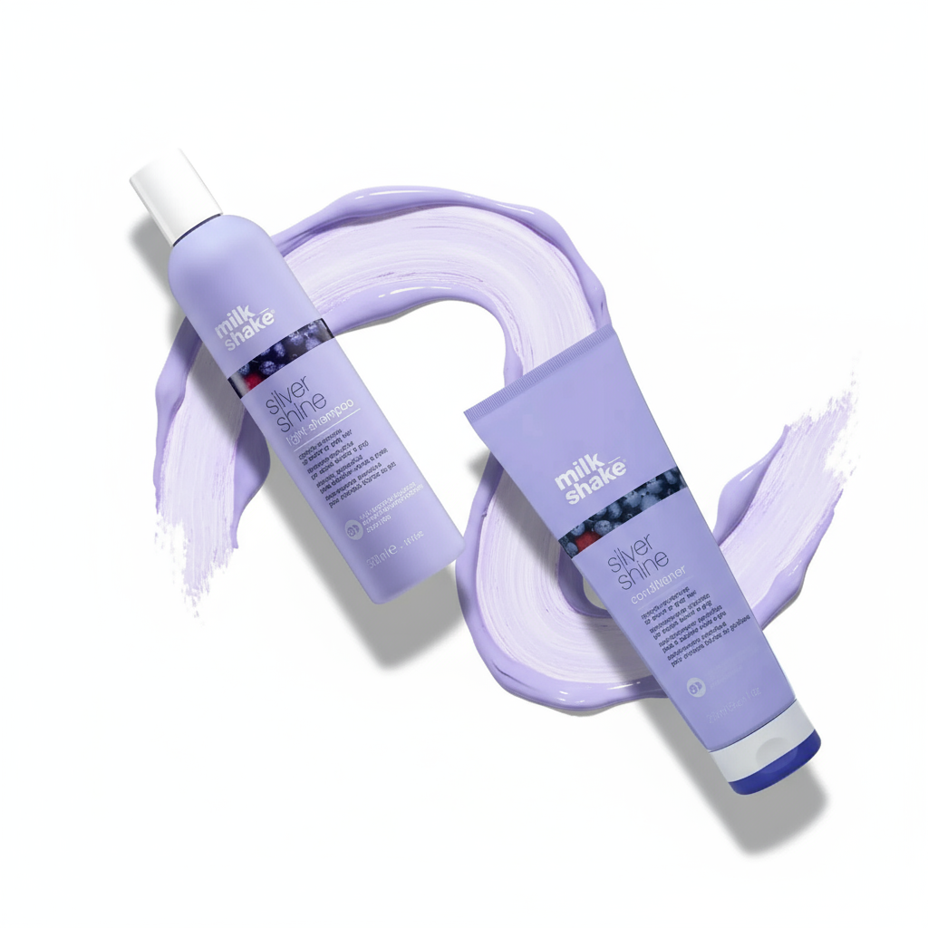 Milkshake Silver Shine Light Duo gift set with shampoo and conditioner bottles on a purple cream background