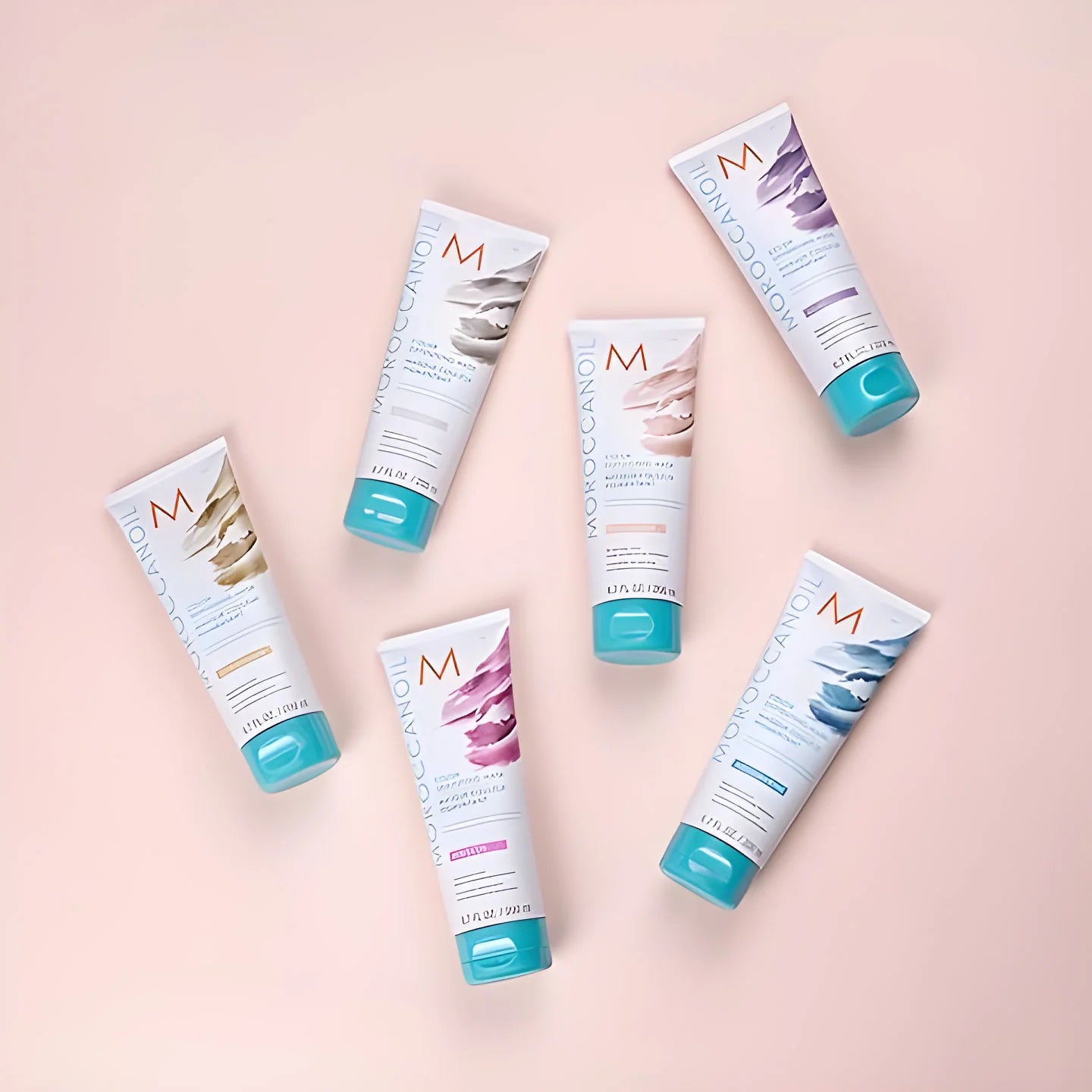 Moroccanoil Color Deposit Masks: Enhance & Refresh Hair Color with Argan Oil. Multiple shades available.