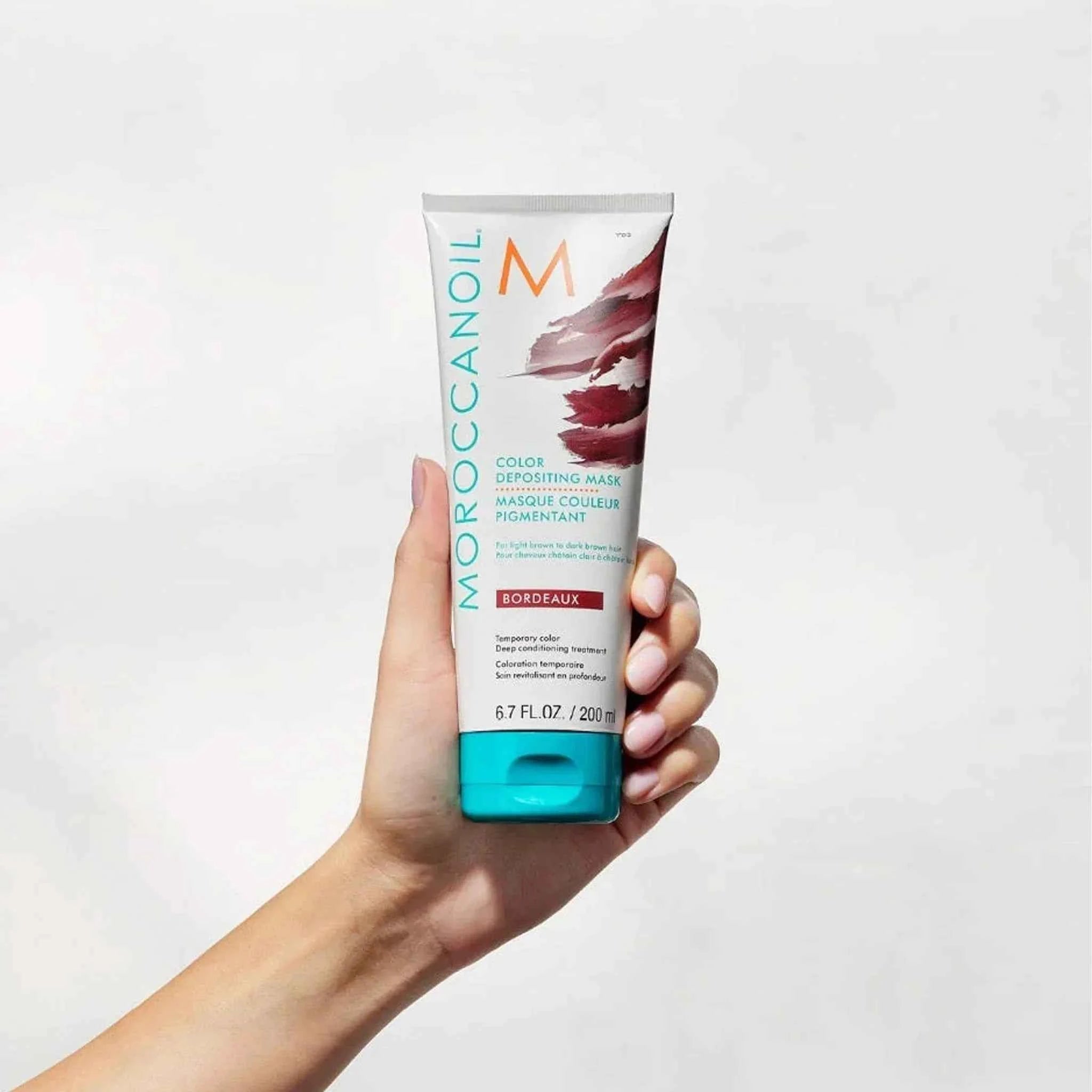 Moroccanoil Color Deposit Mask Bordeaux for vibrant hair color and deep conditioning treatment