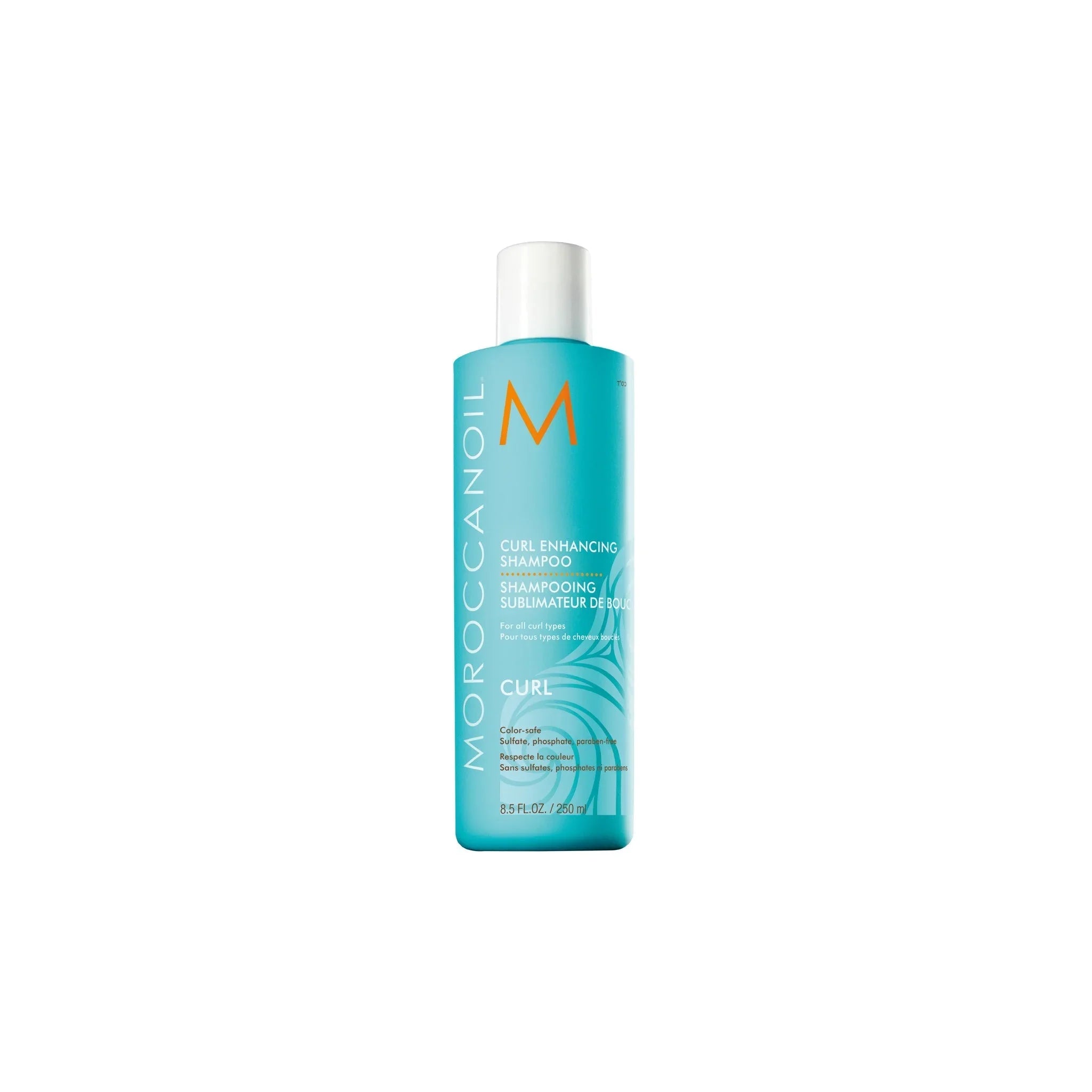 Moroccanoil curl enhancing shampoo in blue bottle with white cap for curly hair care