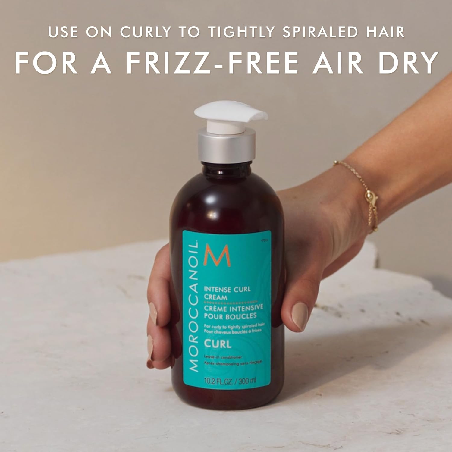 Moroccanoil Intense Curl Cream 300ml hydrates and defines curls for a frizz-free, radiant finish. Perfect for all curl types.