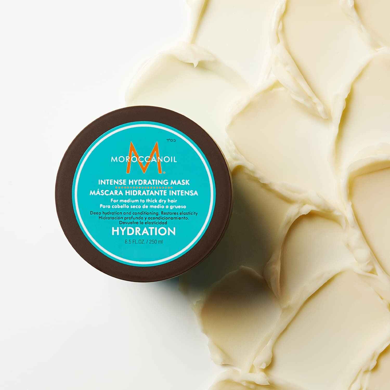 Moroccanoil intense hydrating hair mask jar with creamy texture spread for deep hydration