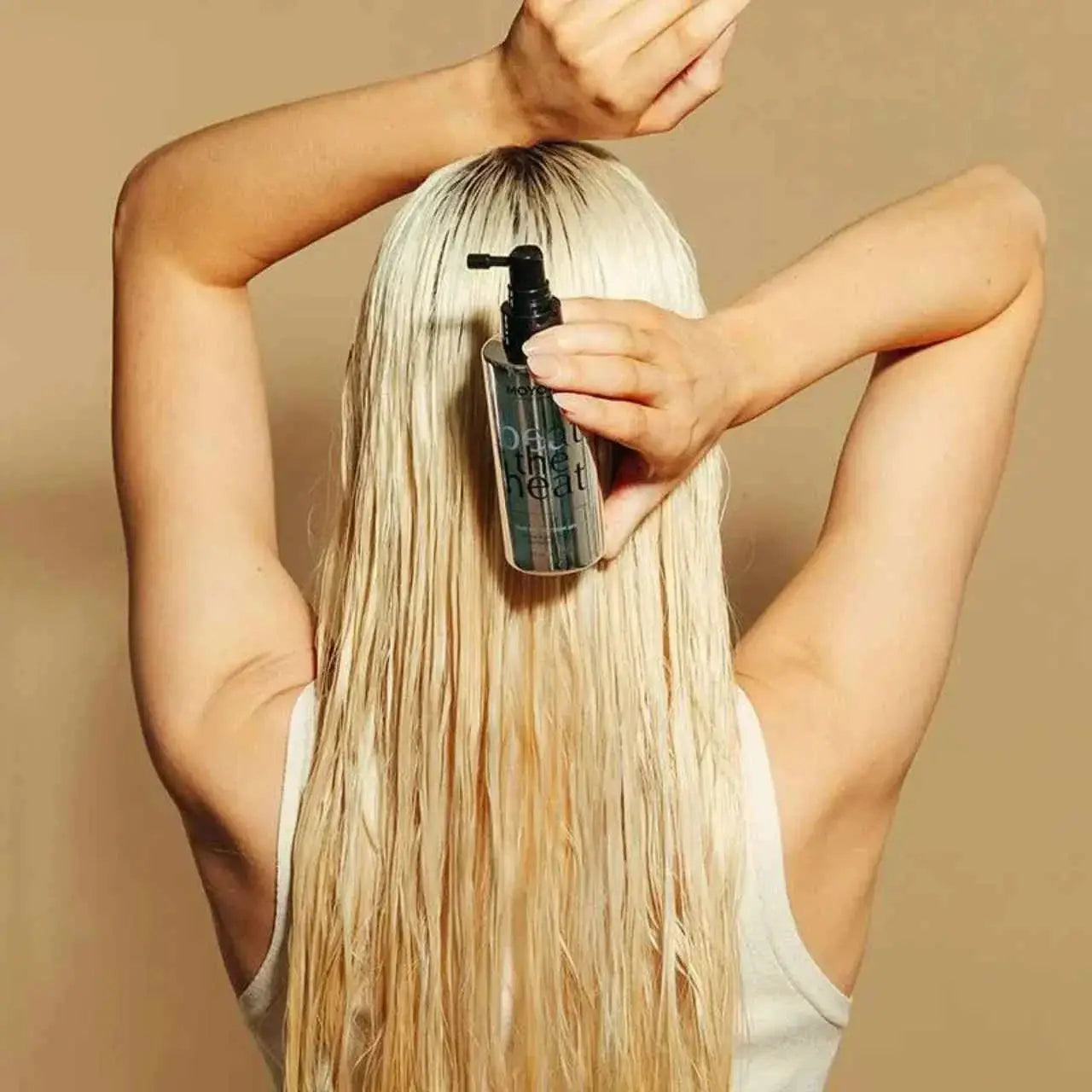 Moyoko Beat the Heat! Heat protectant spray protects blonde hair. Best hair product!