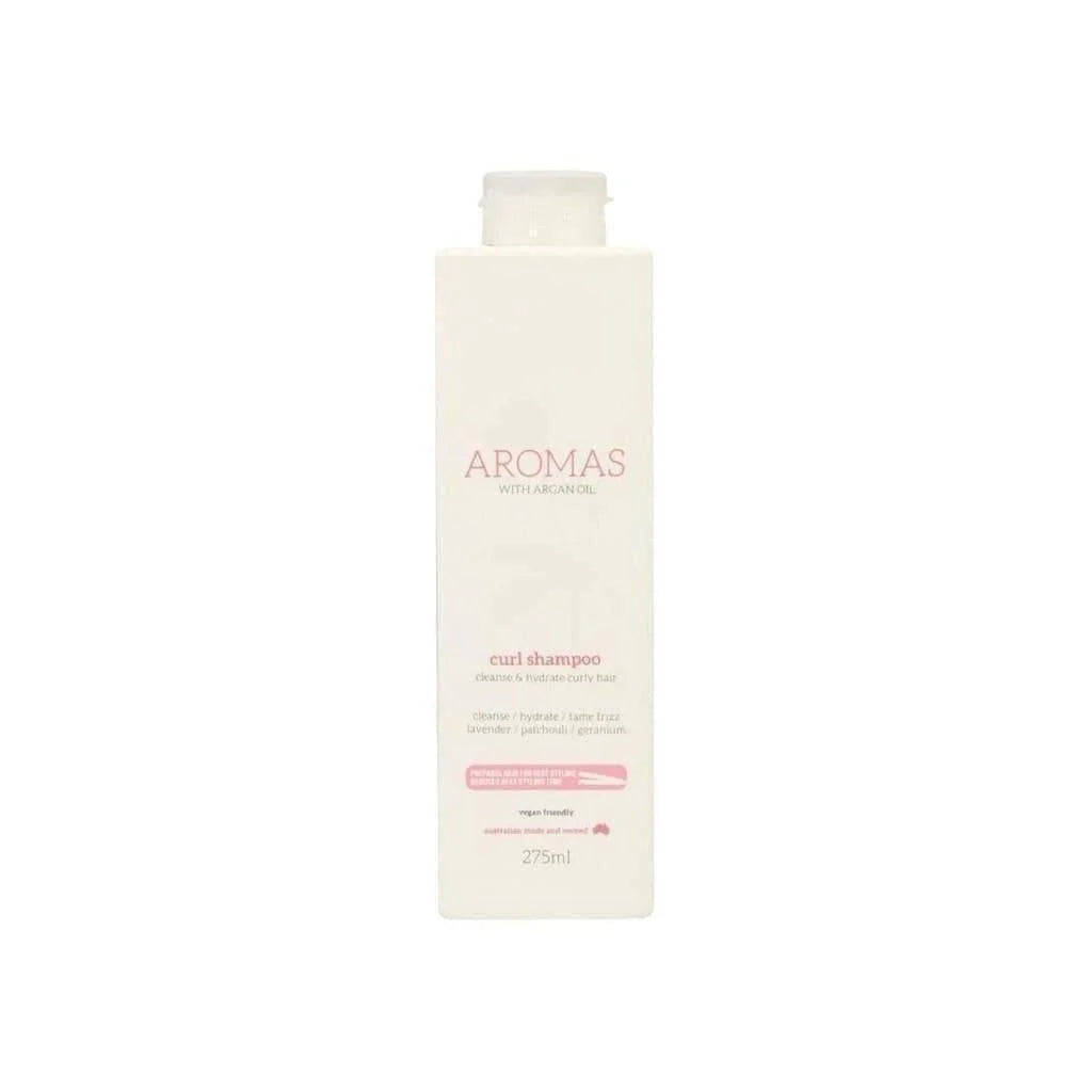 White bottle of Nak Aromas Curl Shampoo with Argan Oil 275ml and pink text