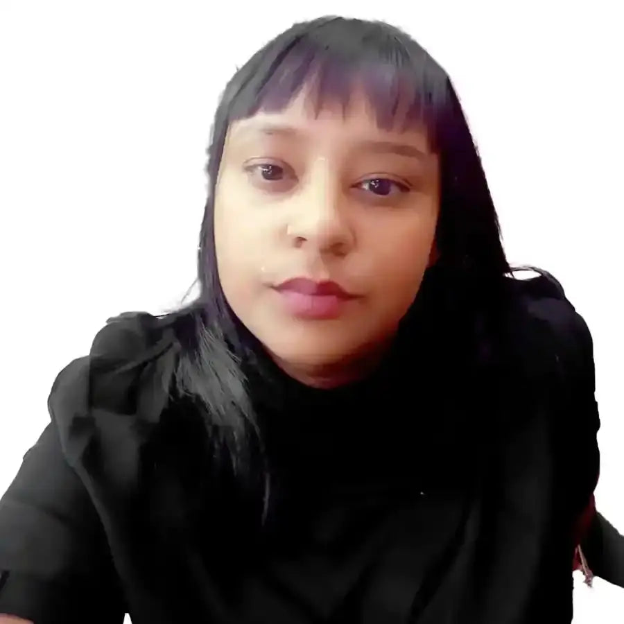 A person wearing a black sweater with straight dark hair and bangs.