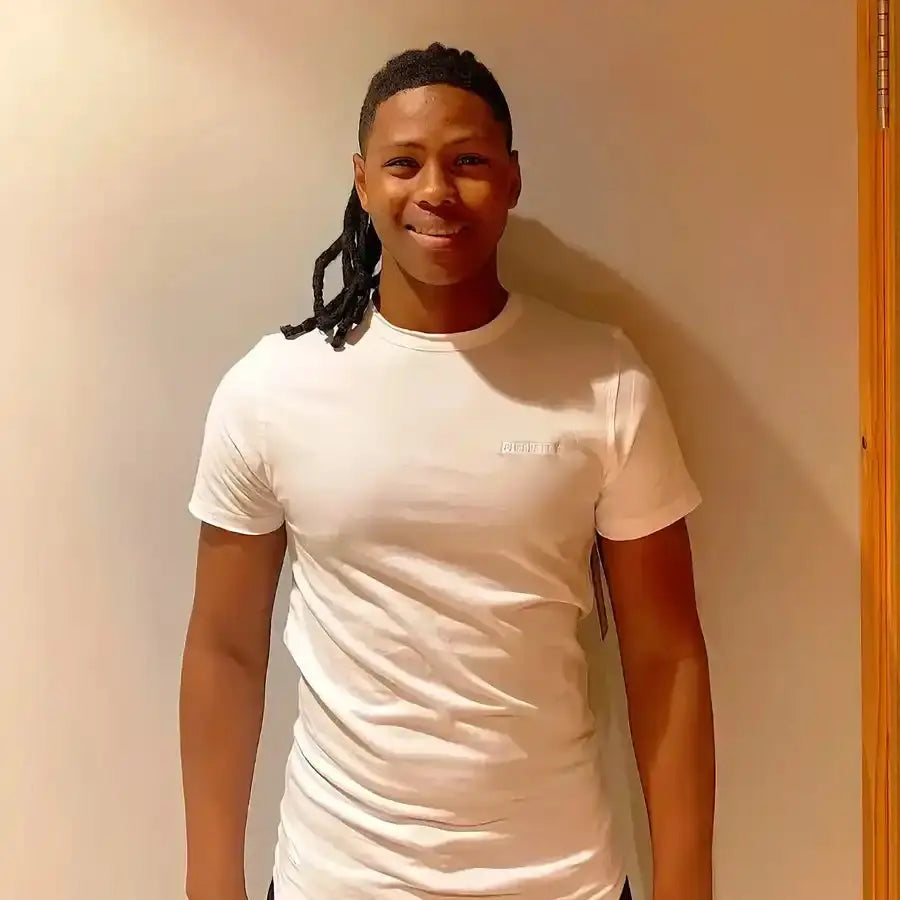 A plain white crew neck t-shirt.