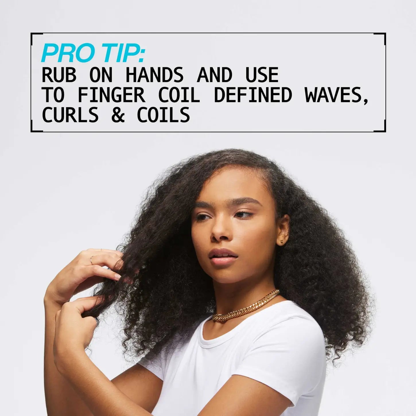 Curly Hair Styling Tip: Finger Coiling Method. Woman with Defined Curls, Waves & Coils. Redken Hair Product Promo.