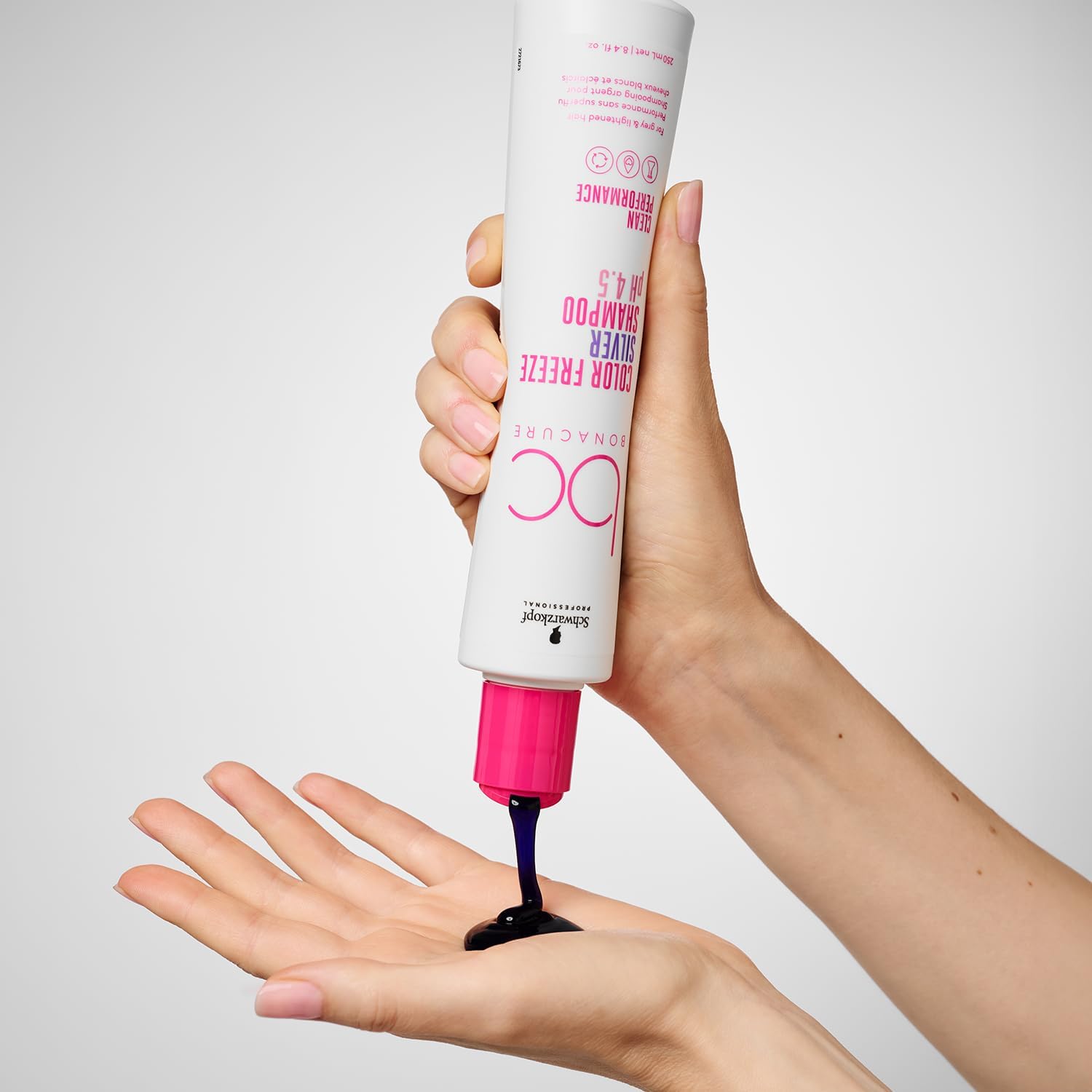 Schwarzkopf Color Freeze Silver Shampoo: Neutralizing Brassiness with Purple Shampoo for Blonde & Gray Hair. Product demo on hand.