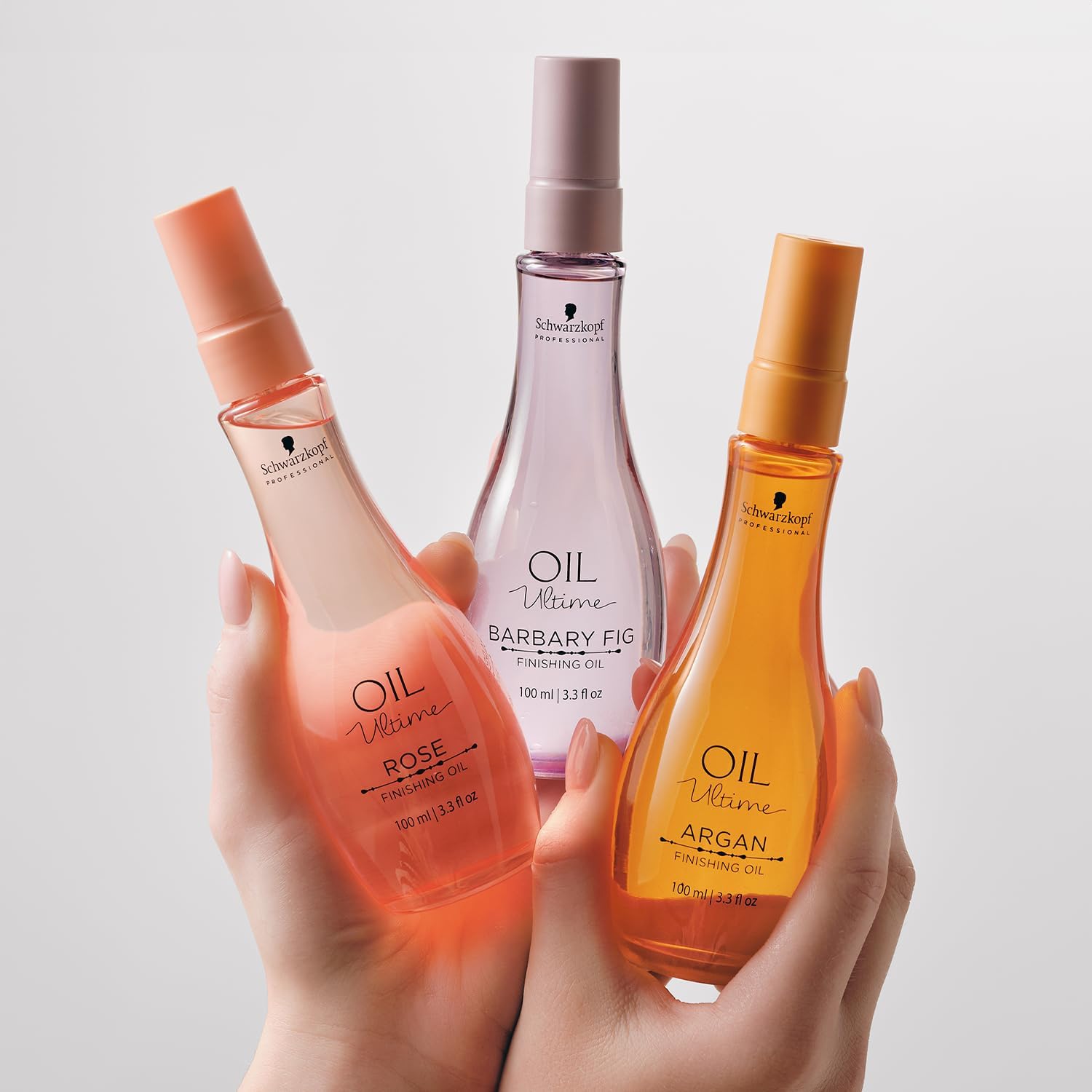 Schwarzkopf Professional Oil Ultime Argan Finishing Oil - 100ml in elegant packaging, perfect for nourishing and styling hair.