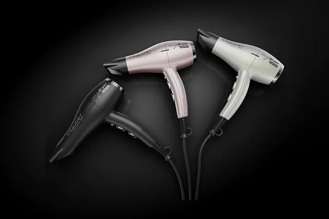 Three hair dryers in a fan pattern showcasing the Veaudry MyDryer and Compact Pro Hairdryer.