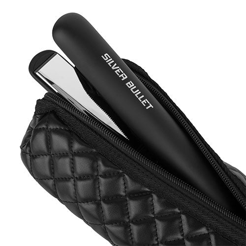 Black hair straightener in quilted case for achieving silky smooth hair with Silver Bullet Hair.