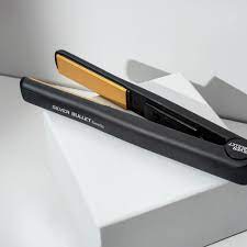 Hair straightener with gold plates and black body from Silver Bullet Glide range.