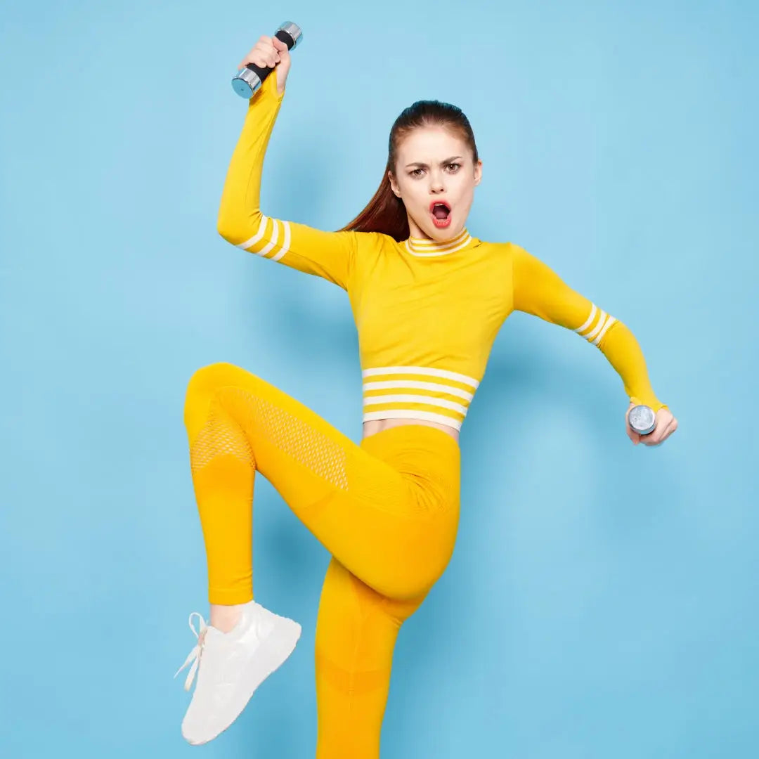 Energetic woman in yellow outfit symbolizes healthy coping mechanisms for emotional well-being.