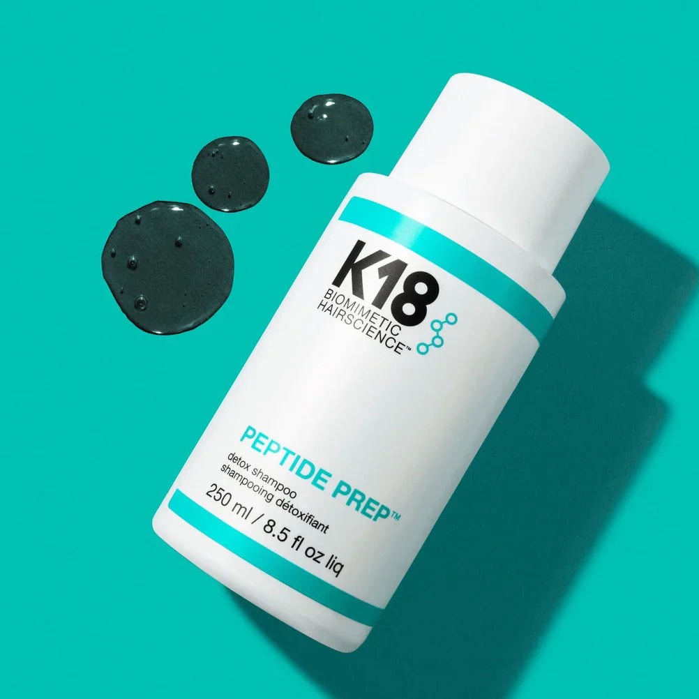 White K18 Peptide Prep hair treatment bottle featured in K18 detox shampoo article.