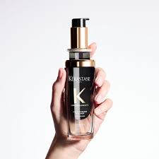 Kérastase Chronologiste Revitalizing Hair Oil in an elegant glass bottle