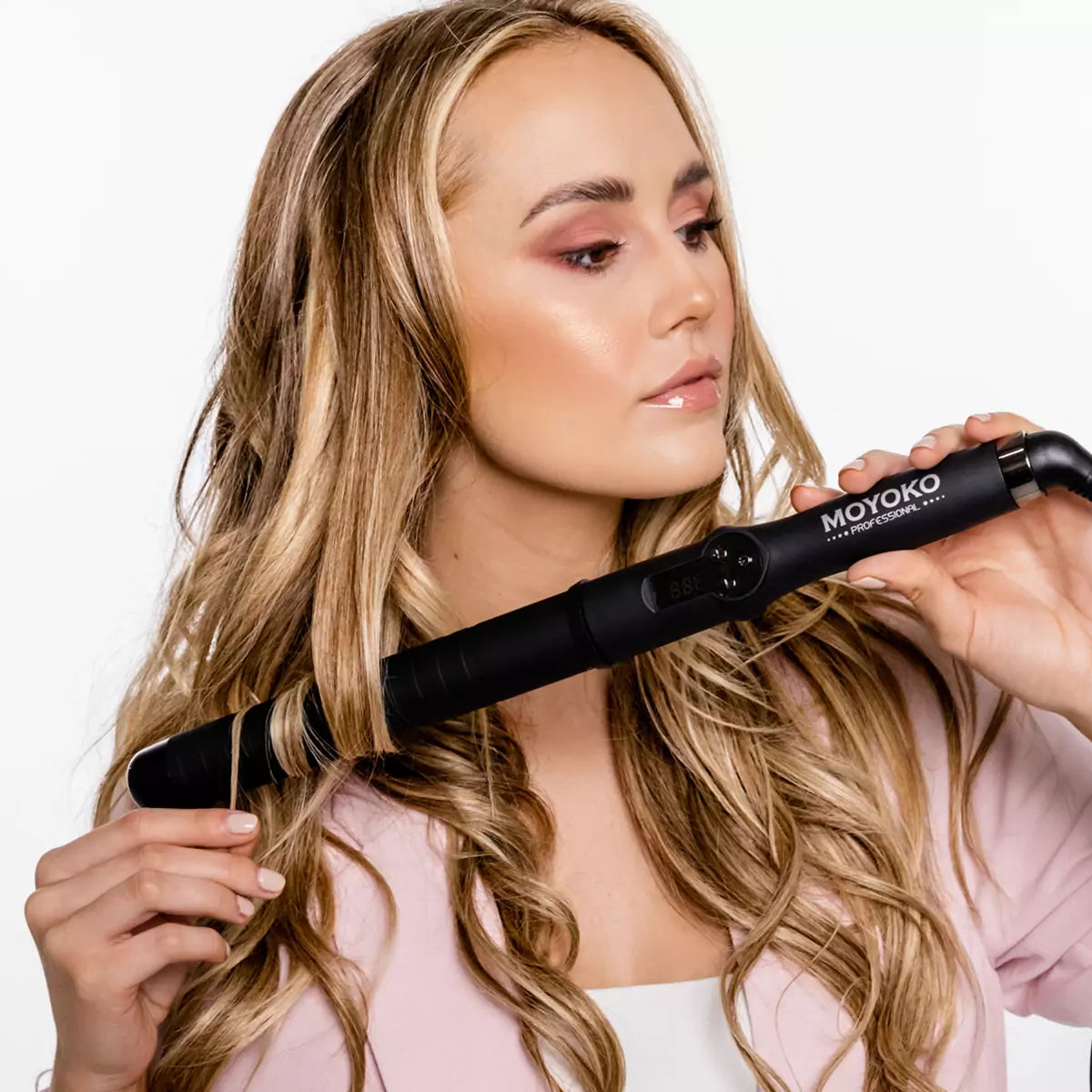 Hair straightener styling long blonde hair with Moyoko Pro Glider and Mycro Keratin.