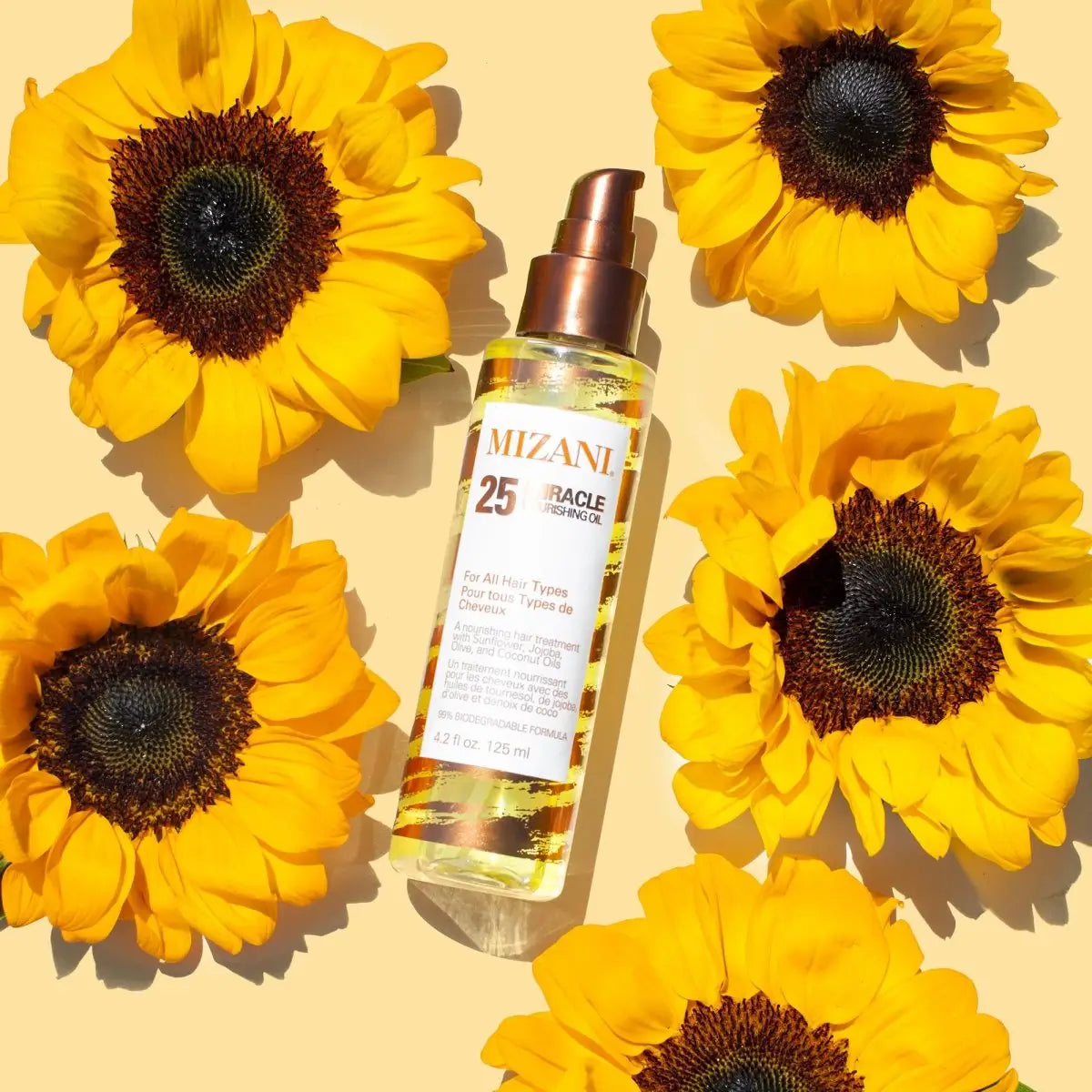 Mizani 25 Miracle Milk hair product for achieving natural hair perfection with sunflowers.