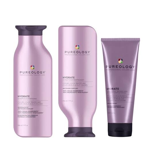 Set of three Purple Pureology Hydrate range products for deep hydration of color-treated hair.