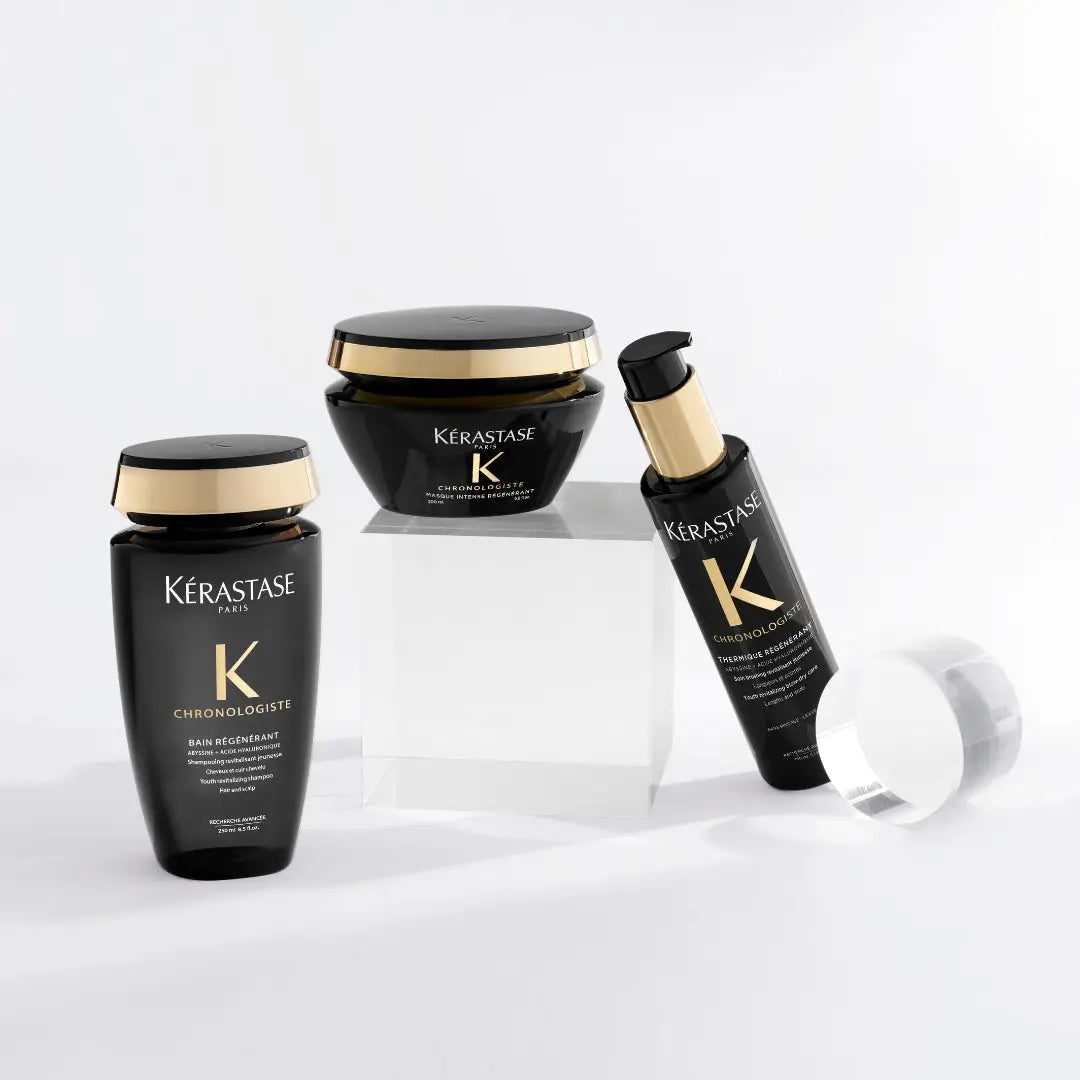 Luxury Kérastase Chronologiste hair care products in elegant black and gold packaging