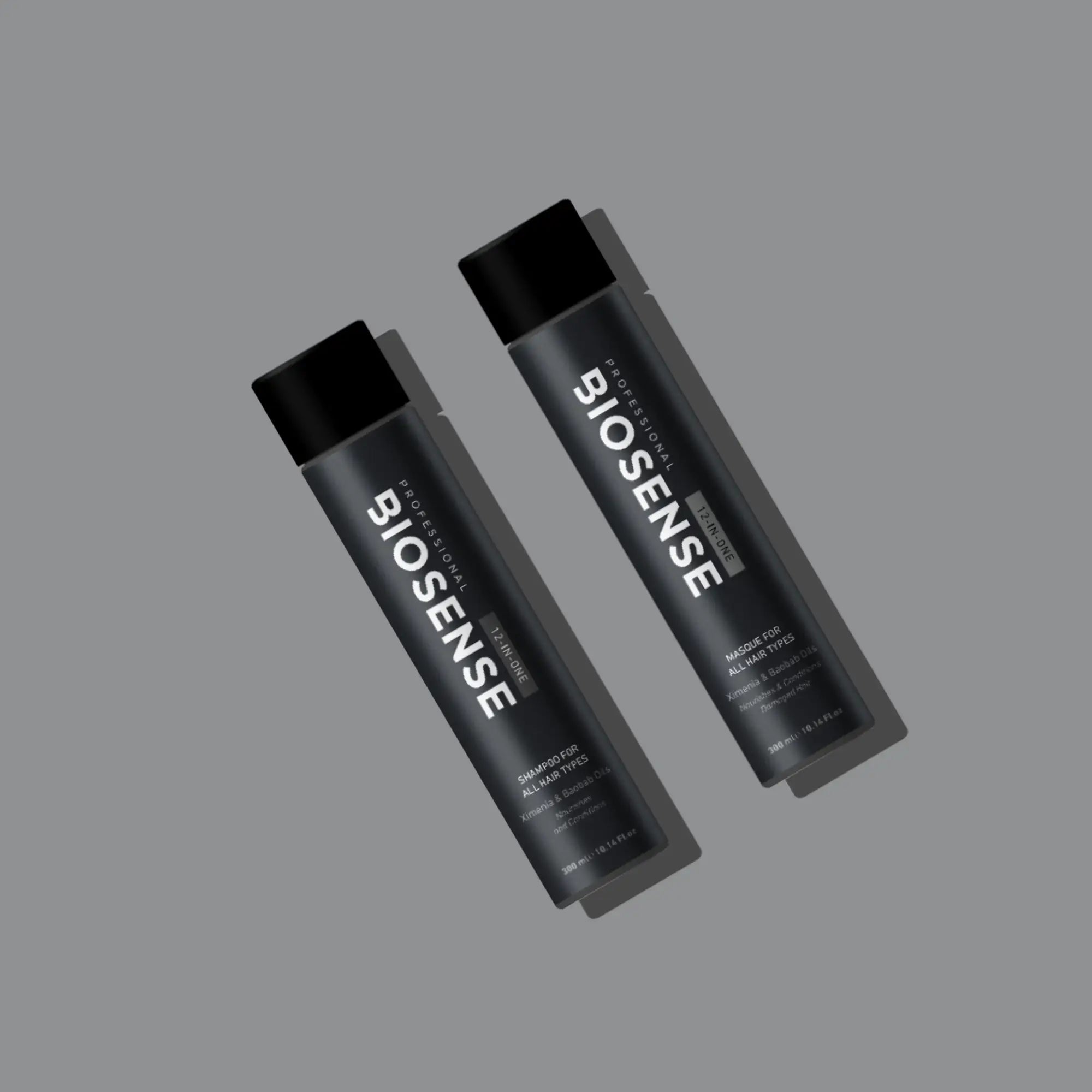 Two black Biosense bottles on a gray background for ultimate 12-in-1 hair care solutions.