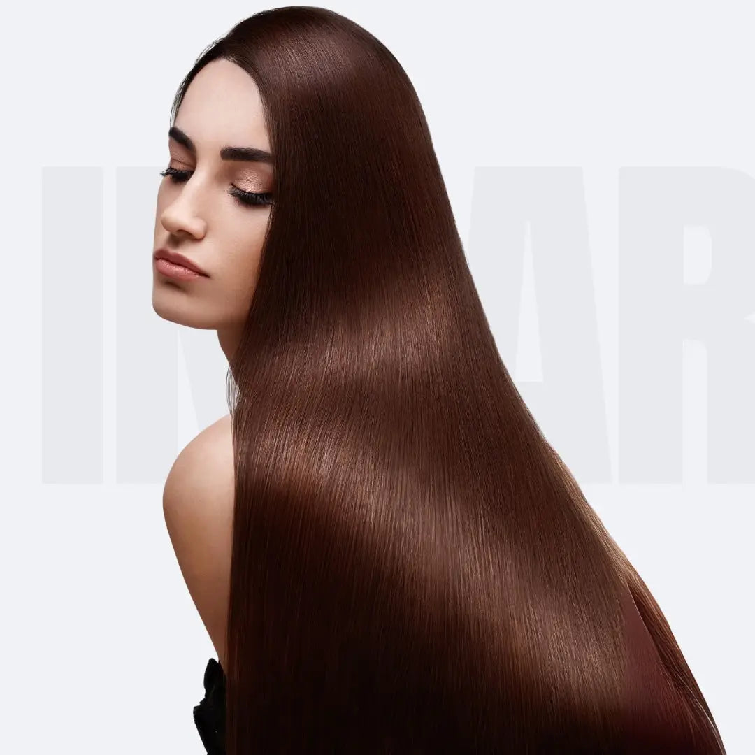 Long, shiny brown hair showcasing the benefits of Japanese silk treatments.