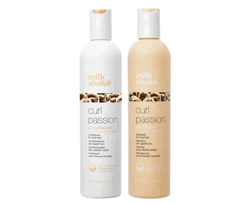 Two Milkshake Curl Passion hair product bottles in collection display