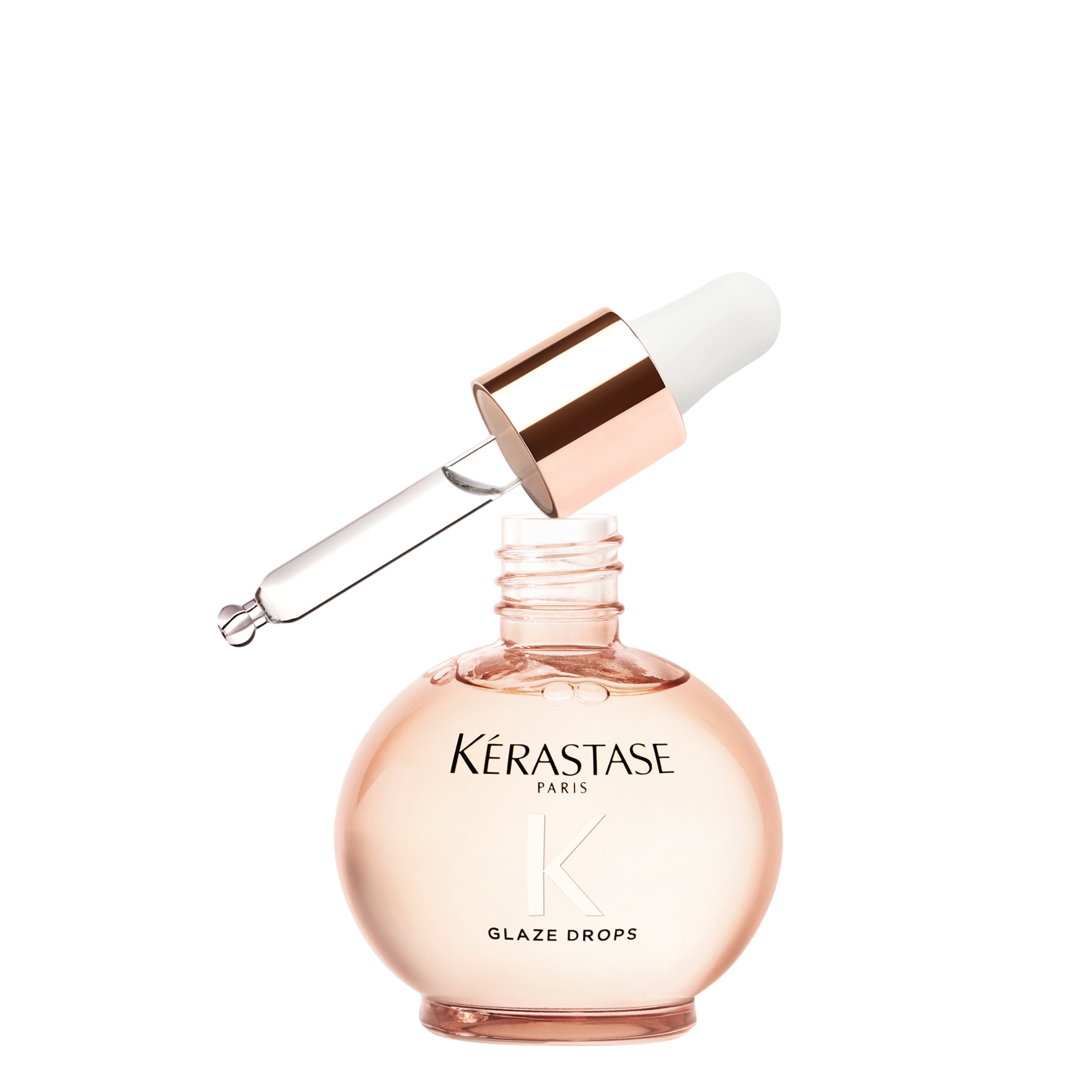 Kérastase professional hair serums and oils collection featuring Elixir Ultime hair oil, Discipline anti-frizz oil, and Genesis fortifying serum on white background - luxury hair care products