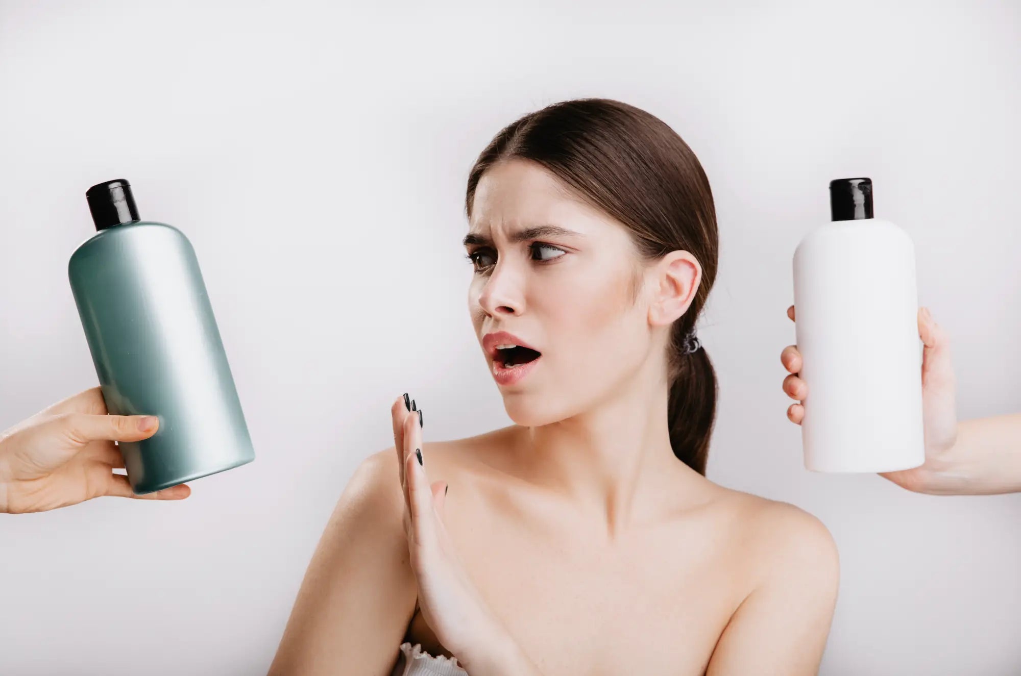 Woman surprised by effective alcohol-free hair care shampoo solutions.