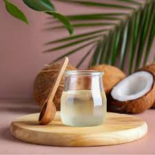 Glass jar with clear liquid on a wooden board, part of the Mycro Keratin Madame collection.