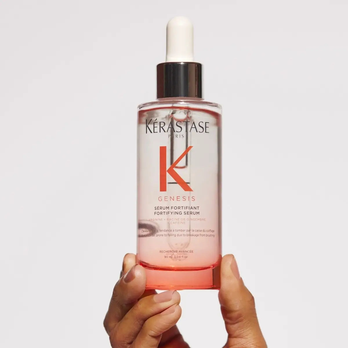 Hair fortifying serum in glass bottle with dropper from Genesis Kerastase Hair Care collection