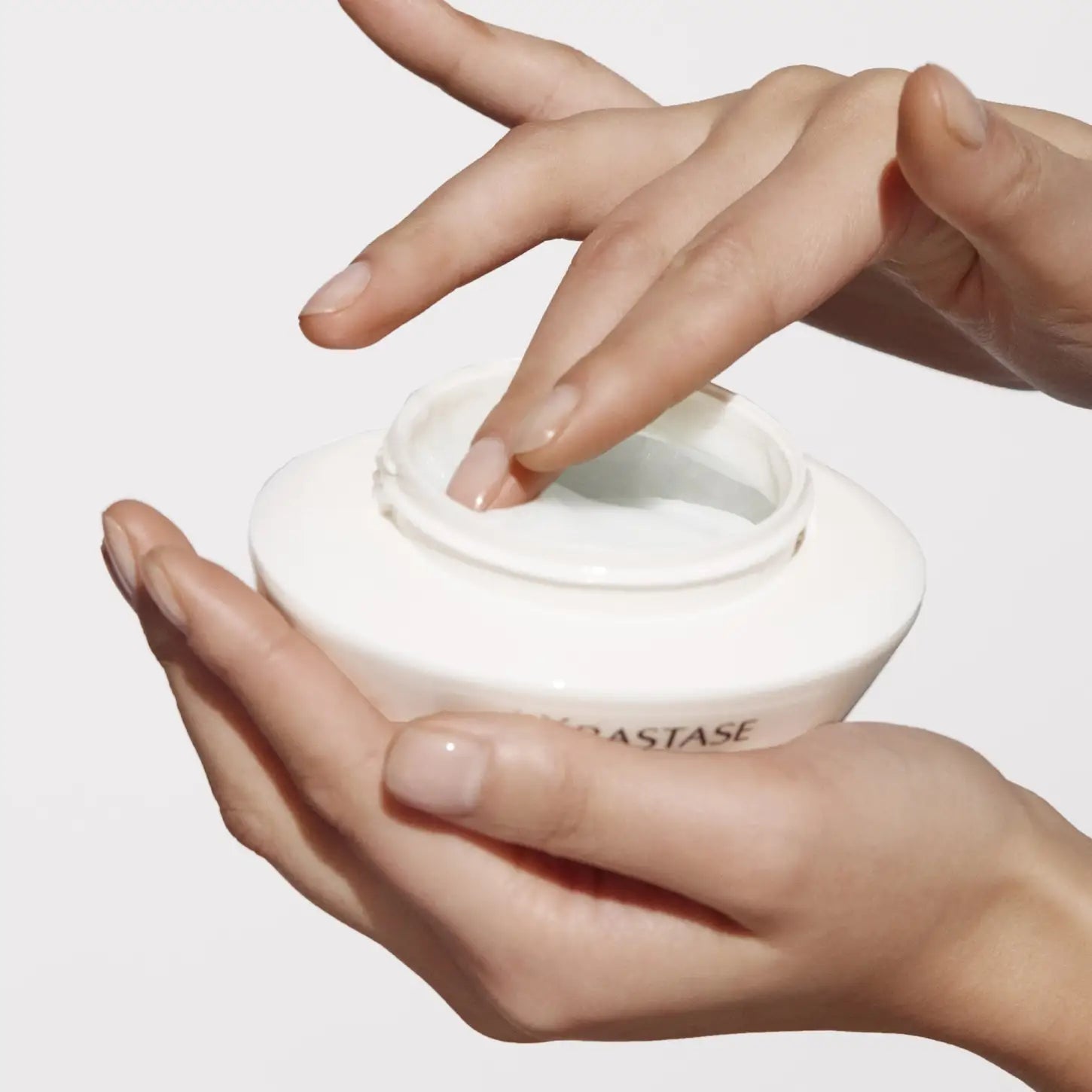 White jar of hair product from Kérastase For All Hair Types luxurious hair care range