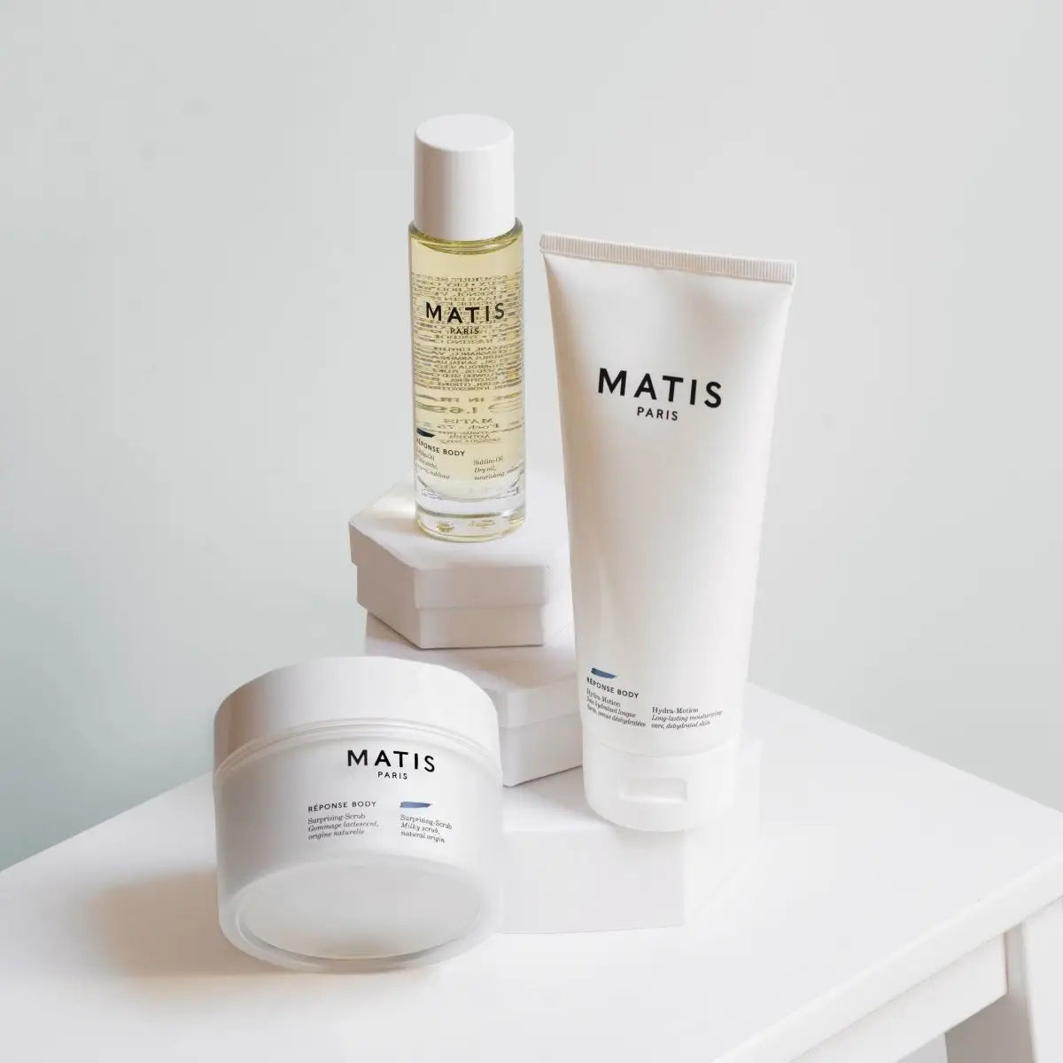 Collection of Matis Paris skincare products featuring bottle, tube, and jar in Matis Skincare.