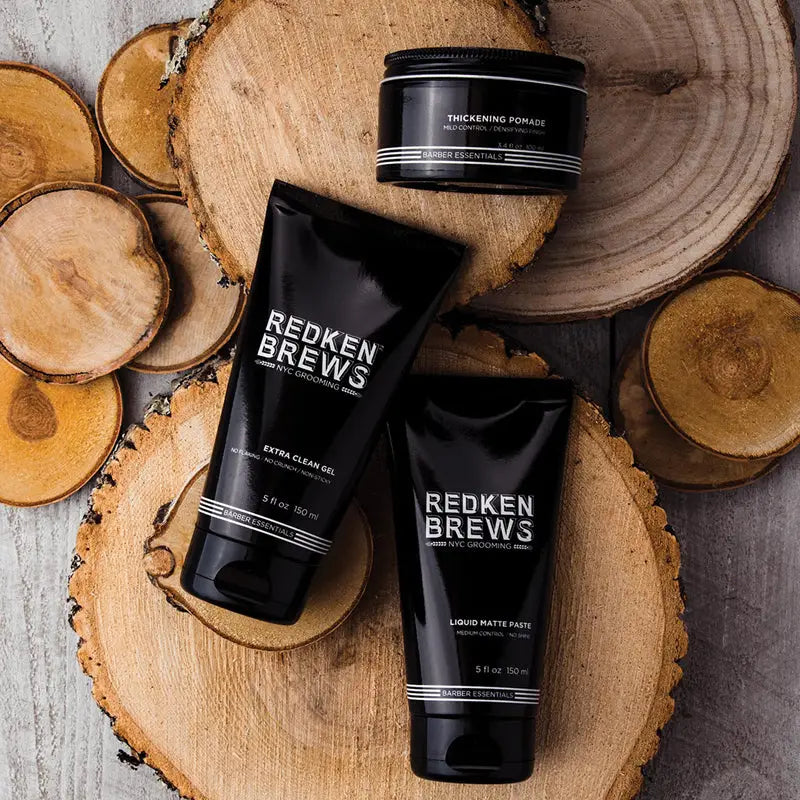 Redken Brews hair products for men: thickening pomade, gel, and liquid matte paste.