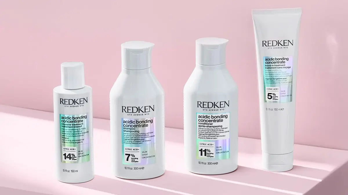 Redken Treatments: Acidic Bonding Concentrate bottles for healthy hair care.