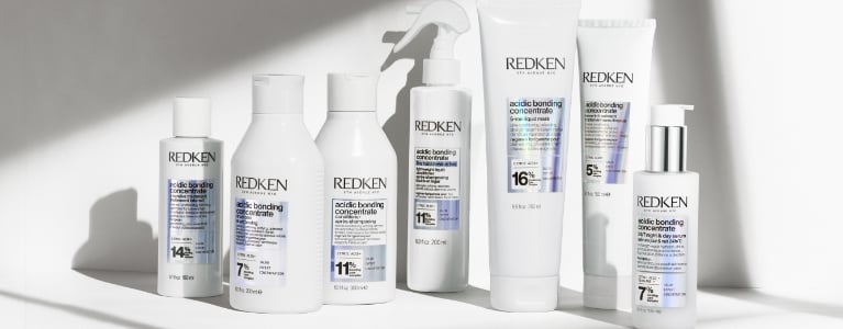 Redken Acidic Bonding Concentrate hair care products for damaged hair repair - professional bond strengthening shampoo and conditioner collection